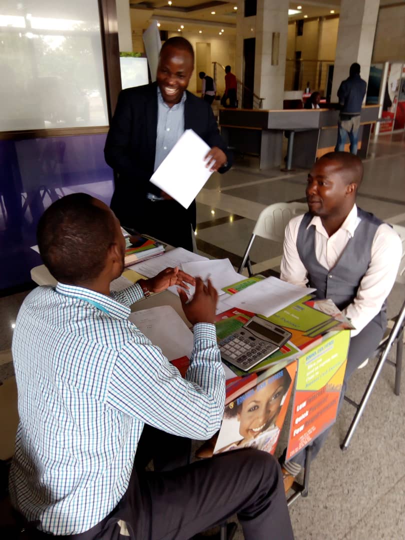 Clients  are Signing in Zambia Microfinance